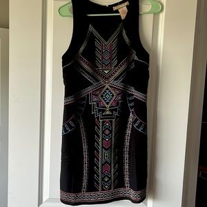 Black sleeveless mini dress